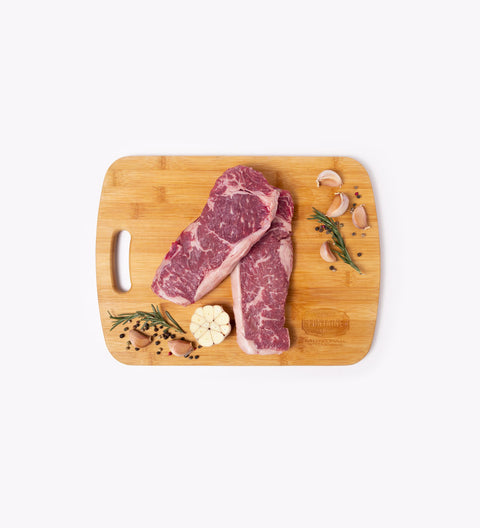 Bifteck de contrefilet de boeuf vieilli AAA (2 unités par sac - entre 560 et 720 g) Congelé